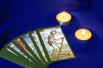 Tarot cards with candles