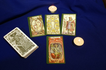 Tarot cards with candles