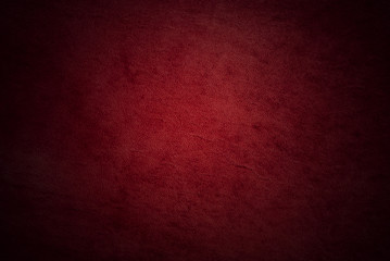 Natural qualitative red leather texture. Close up.