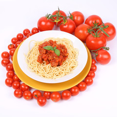 Spaghetti Bolognese with basil, tomatoes and cherry tomatoes