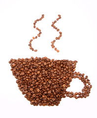 Cup of coffee shape made of coffee beans on white