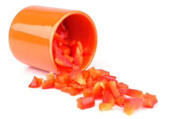 Fototapeta premium Verrine de dés de poivron rouge renversée