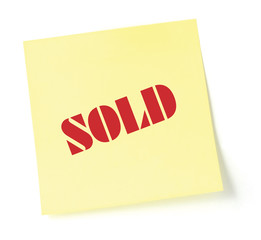 Sticky note indicating item is sold, isolated