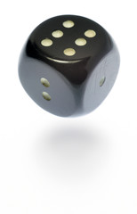 Floating black dice over white background.