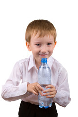 Happy boy with a bottle of water