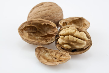 Close up shot of walnut on white background