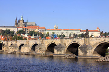 Fototapeta na wymiar View on the autumn Prague gothic Castle with the Charles Bridge