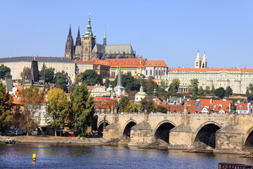 Fototapeta premium Autumn Prague gothic Castle with the Charles Bridge