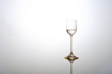 Liqour glass with golden reflections