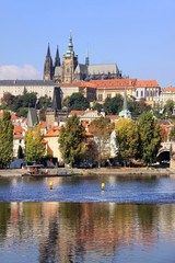The View on autumn Prague gothic Castle above River Vltava