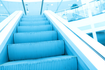 Fototapeta premium perspective view to moving staircase in metro station