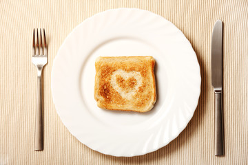 Toast and heart on a plate