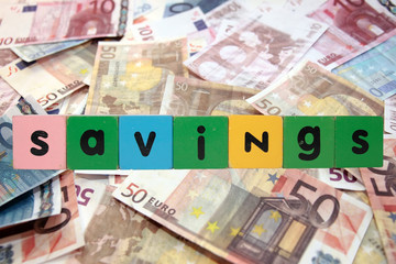 cash savings in toy letters