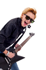 girl with sunglasses playing guitar