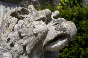 Fototapeta na wymiar Griffin sculpture in English garden