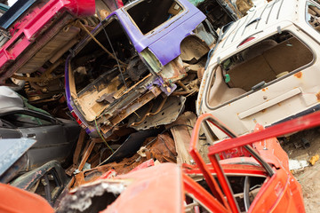 Vehicles rust on scrapyard
