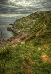 Tall view along cliff tops in Lulworth Cove on Jurassic Coast