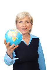 Fototapeta premium Senior corporate woman hold a globe