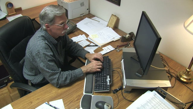 Businessman at Desk 2
