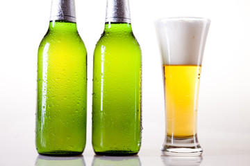 Glass of beer on a white background 
