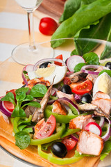 Salad Nicoise with salmon and anchovies
