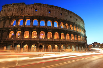 Colosseum at twilight, with traffic light trails