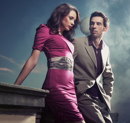 Handsome young couple standing