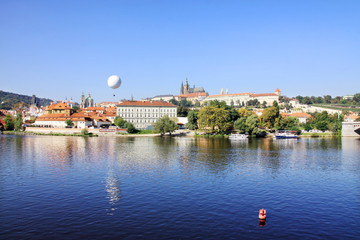 View on the autumn Prague gothic Castle above River Vltava