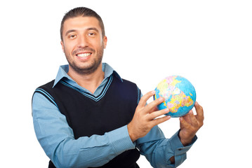 Smiling business man showing a globe