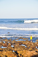 Fisherman on the rocks