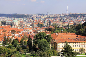 Fototapeta na wymiar View on the autumn Prague with St. Nicholas' Cathedral