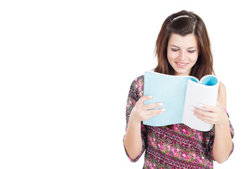 pretty teen girl reading book