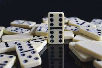 dominos fallen around a double six