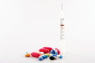 Medical syringe and pills