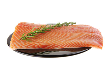 fresh uncooked red fish fillet and rosemary