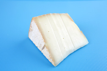 ight swiss cheese on blue