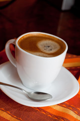 Hot espresso  coffee in a White Cup