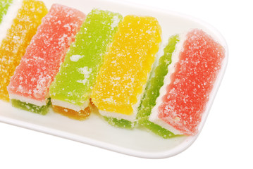 Fruit candy slices on the white
