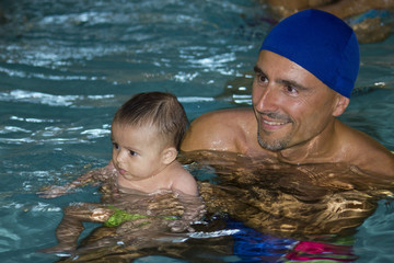 Father and Daughter in the Swimming Pool, Italy