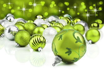 Green christmas ornaments with star background