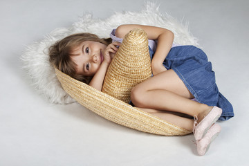 Cute little girl in a mexican big hat, sumbrero © ANA MARIA TANASESCU