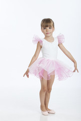 Lovely little ballerina learning new ballet position