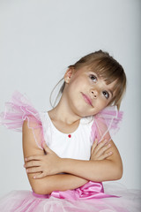 Fototapeta premium Adorable little ballerina looking sideways