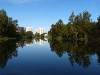 Fototapeta premium The city and its reflection