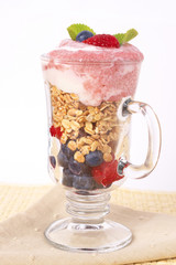 Healthy breakfast with muesli and yoghurt