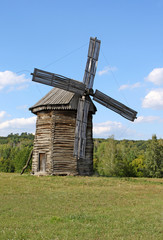 Fototapeta na wymiar Windmill in the village