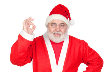 Funny Santa Claus saying OK with his thumbs