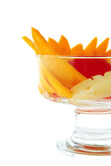 small glass cup and fruits