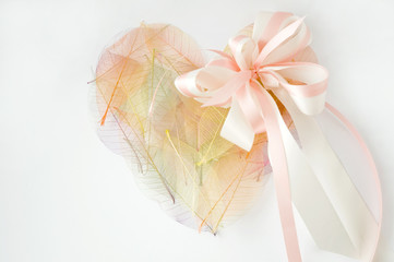 pink pastel heart with ribbon