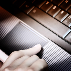 Working at laptop .